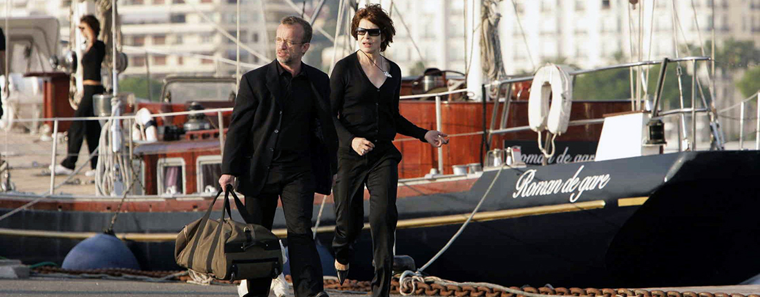 Dominique Pinon as Pierre Laclos and Fanny Ardant
as Judith Ralitzer in Claude Lelouch's "ROMAN DE GARE."