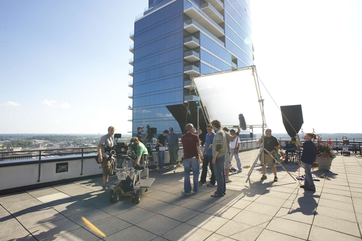 The crew works on the 17th floor landing for a scene in the movie "What If..." directed by Dallas Jenkins.