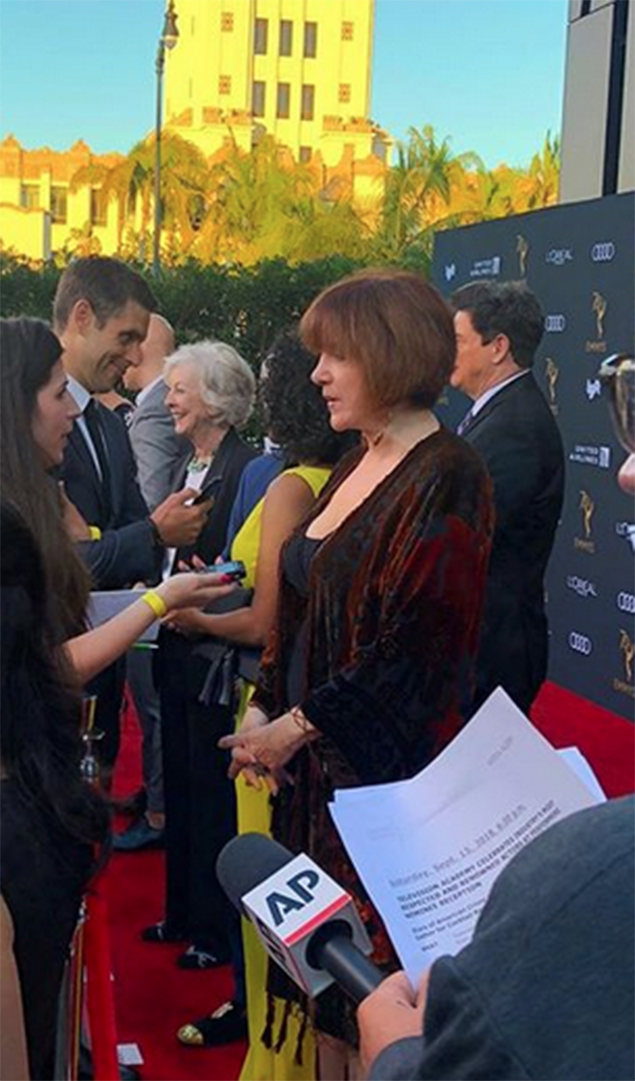Lee Garlington being interviewed on the red carpet.